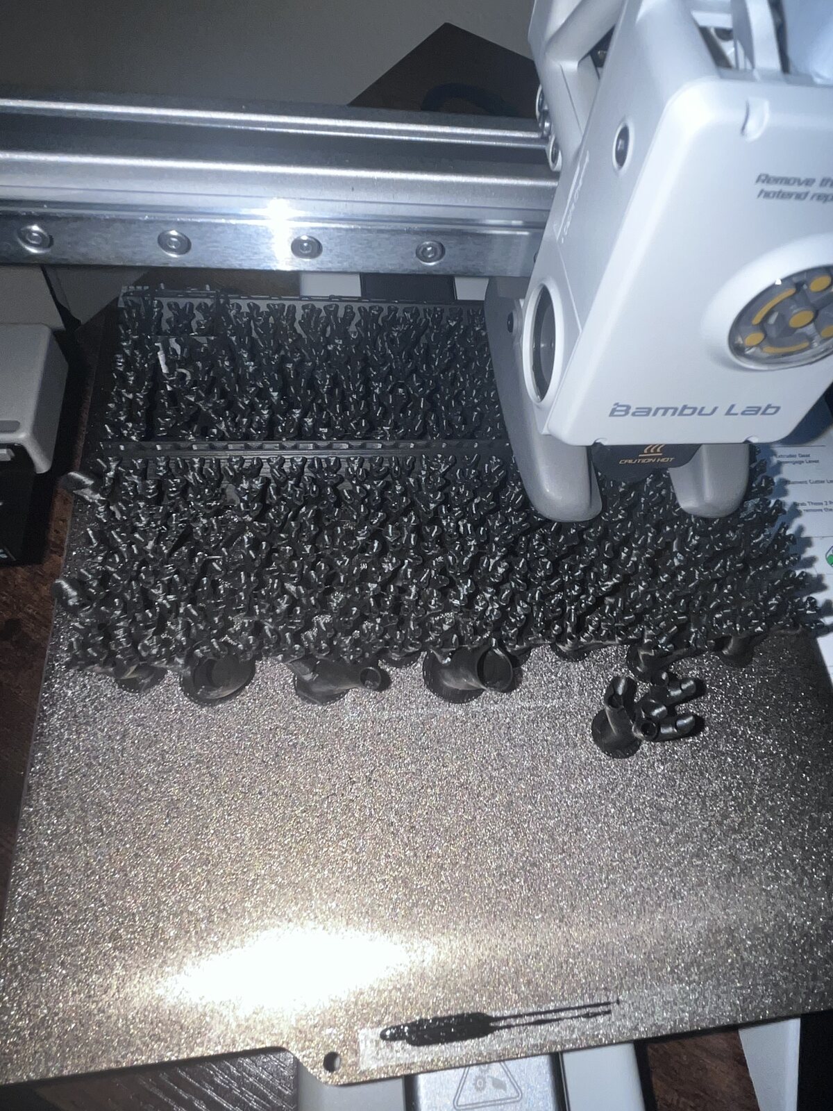 Close-up of the enclosure support trees during 3D printing